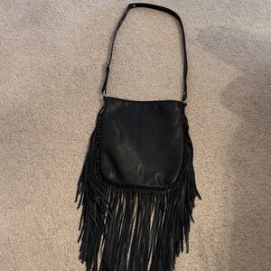 Coach Limited edition, leather fringe bag. 
New!! Never worn! PERFECT